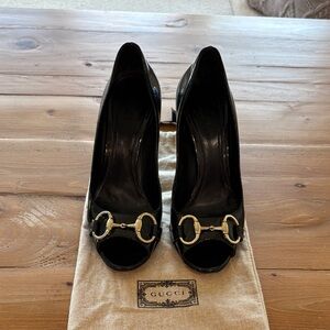 Gucci Black Heels with Gold Buckle Detail